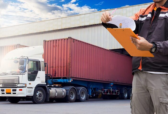 logistic-warehouse-warehouse-loader-are-holding-clipboard_36860-107